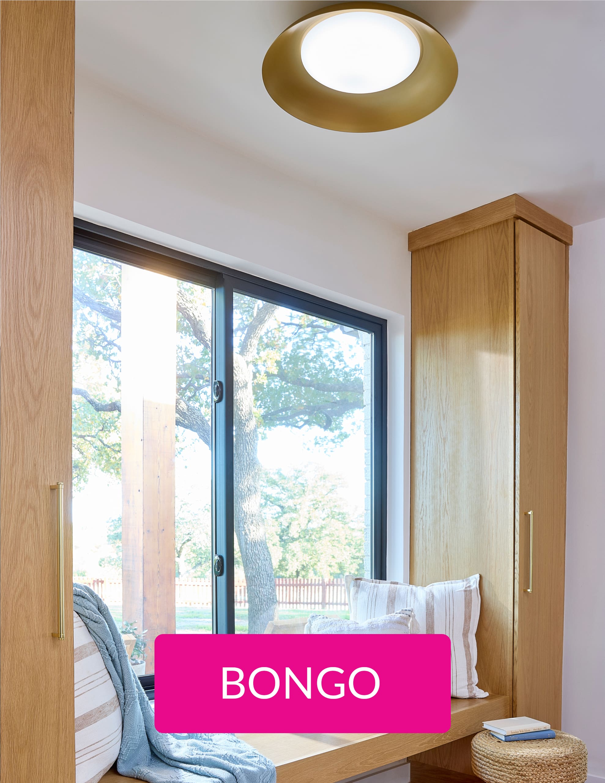 A room corner with a wide window and some cushions. With a pink button with the words Bongo